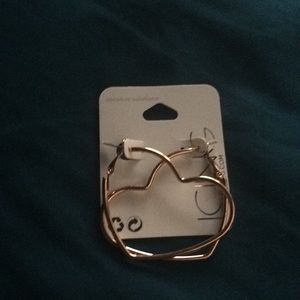 Gold heart shaped hoops